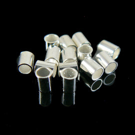 2mm inside diameter, size 4 silver plated crimp tubes, 20gm, ~420-440 pcs. 2.5mm wide by 3mm high. Use with .030" wire. Large crimps