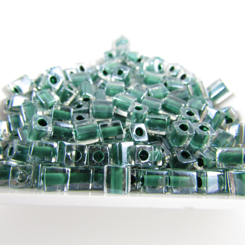 Miyuki 4mm square glass seed beads: Clear Color Lined Dark Green, SB217, 20g (~208 beads)