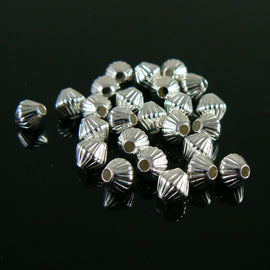 Metal beads: 5mm corrugated bicone, silver plated brass, 1.2mm hole, 25 beads
