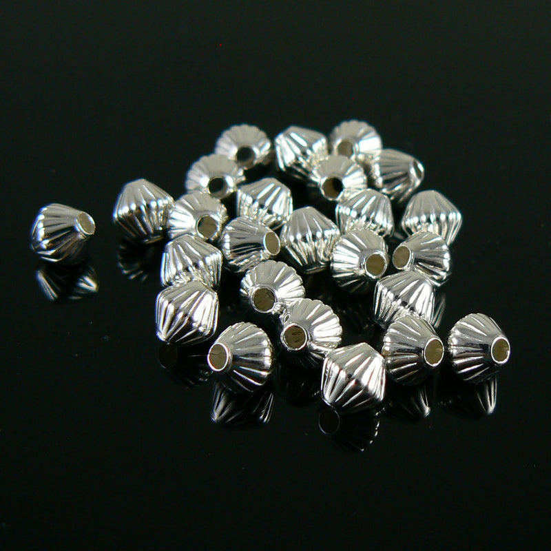 Metal beads: 5mm corrugated bicone, silver plated brass, 1.2mm hole, 25 beads
