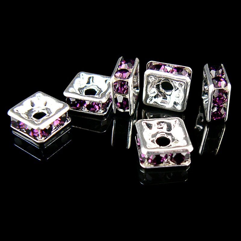 Metal beads: 8 mm squardelles, silver plated metal with amethyst glass rhinestones, 6 beads