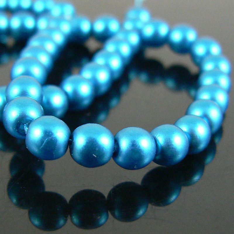 Glass pearl beads: 4 mm matte electric turquoise blue, 8" strand, 50 beads