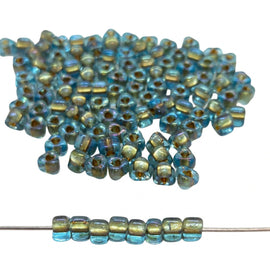 Miyuki #5 (4mm) Triangle Glass Seed Beads: Sparkling Bronze Lined Aqua, TR1825, ~22g tube
