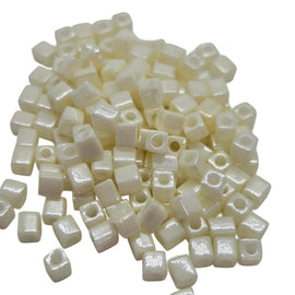 Miyuki 4mm square glass seed beads: opaque metallic cream, SB421, 20g (~208 beads)