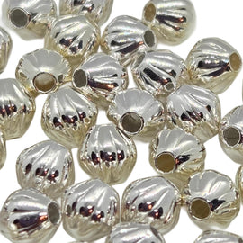 Metal beads: 4 mm corrugated bi-cone, silver plated brass, 1 mm bead hole, 50 beads