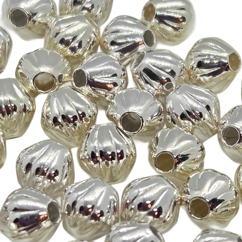 Metal beads: 4 mm corrugated bi-cone, silver plated brass, 1 mm bead hole, 50 beads