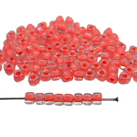 Miyuki #5 (4mm) Triangle Glass Seed Beads: Clear Salmon Lined, TR1122, ~22g tube