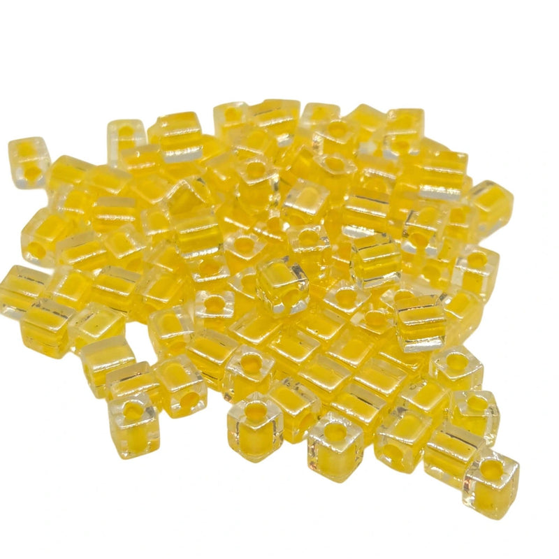 Miyuki 4mm square glass seed beads: clear color lined yellow, SB202, 20g (~208 beads)