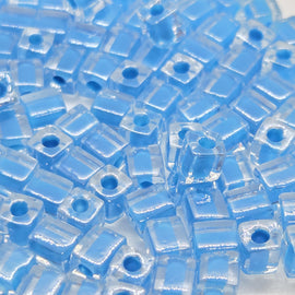 Miyuki 4mm square glass seed beads: clear color lined teal, SB247, 20g (~208 beads)