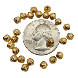 Metal beads: 5mm corrugated bicone, gold plated brass, 1.2mm hole, 25 beads