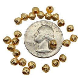 Metal beads: 5mm corrugated bicone, gold plated brass, 1.2mm hole, 25 beads