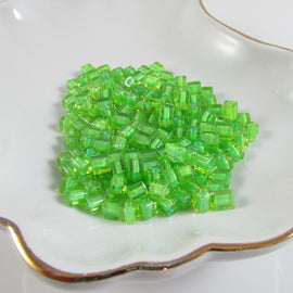4mm lime color lined dark green square beads, Miyuki SB2634, 20gm, ~208 beads