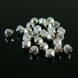 5mm silver plated brass corrugated bi-cone beads, 25 pieces. 1.2mm hole.