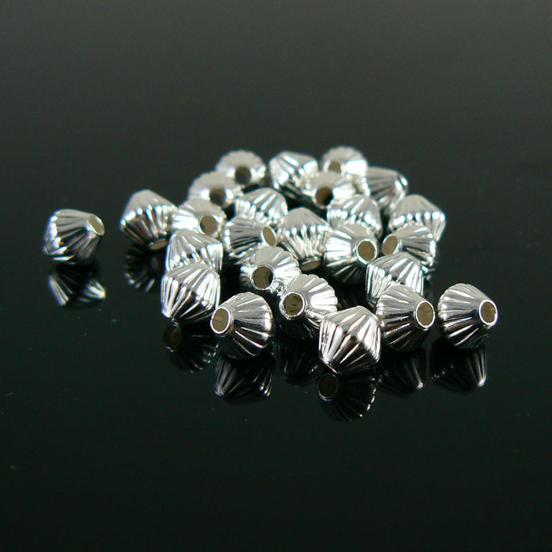 5mm silver plated brass corrugated bi-cone beads, 25 pieces. 1.2mm hole.