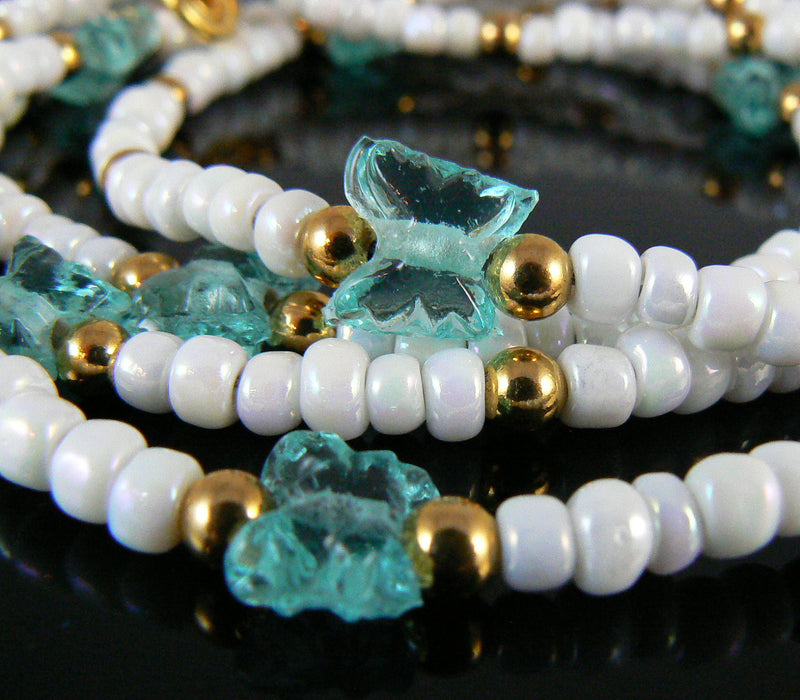 Size 6/0 opaque white rainbow Matsuno glass seed beads, 20gm, ~340 beads