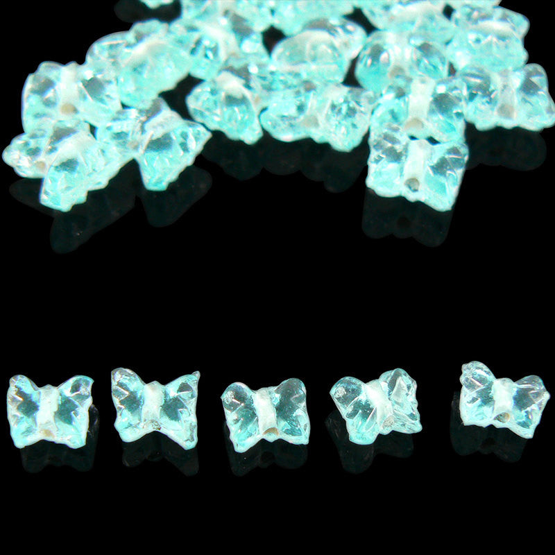 9mm x 8mm transparent ice blue pressed glass butterfly shaped beads