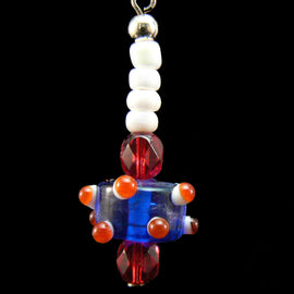 12-16mm x 7mm blue lampwork glass drum beads w/ red and white bumps. 12 beads